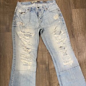 Men’s distressed boot cut jeans